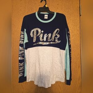 PINK long-sleeved sequins t-shirt size small but fits a M
